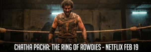 "A wider view of Roshan Mathew's character in the wrestling ring, re-emphasizing the 'CHATHA PACHA: THE RING OF ROWDIES' Netflix release date of Feb 19 with a text overlay."