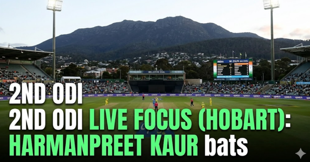 This stadium shot is set at Bellerive Oval, Hobart, featuring the specific mountain backdrop. It includes an active match situation with a scoreboard showing India at 212/6 in the 45th over, focusing on Harmanpreet Kaur batting