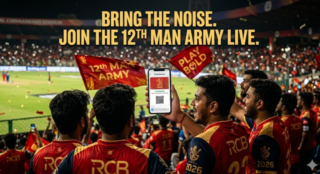An action photograph taken from behind a group of passionate cricket fans in a packed M. Chinnaswamy Stadium at night, cheering loudly during an RCB match under bright floodlights. The electric atmosphere is filled with thousands of supporters and smartphone camera lights. The focus is a group of four young Indian male fans in the foreground. All wear the new season red and gold Royal Challengers Bengaluru (RCB) 2026 jerseys, with 'RCB' and '2026' text clearly visible. The central fan displays two banners: one reading '12th MAN ARMY' and the other 'PLAY BOLD.' This fan is holding up a smartphone which displays a digital ticket confirmation screen with the text 'Ticket Booked,' 'CONFIRMED!', and a visible QR code. Overlayed across the top third of the image in a bold, urgent golden athletic font is the text: 'BRING THE NOISE. JOIN THE 12TH MAN ARMY LIVE.' The image radiates raw match-day energy and serves as a direct call-to-action for fans to secure their seats.